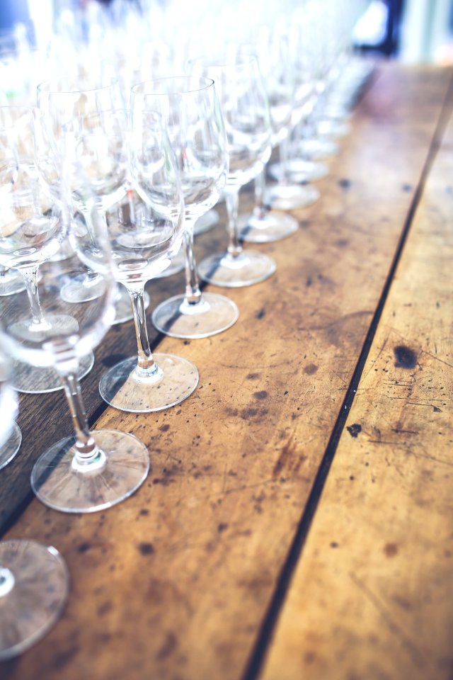 Wine glasses on the wooden table