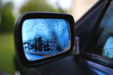 Drops on a car mirror photo
