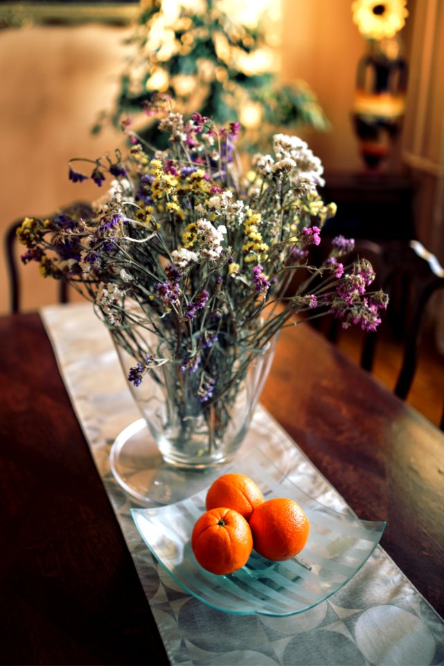 Table decor: flowers & oranges photo