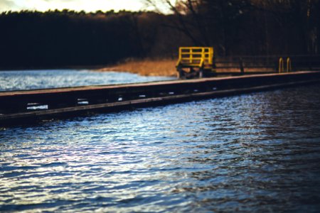 Old wooden pier over the lake photo