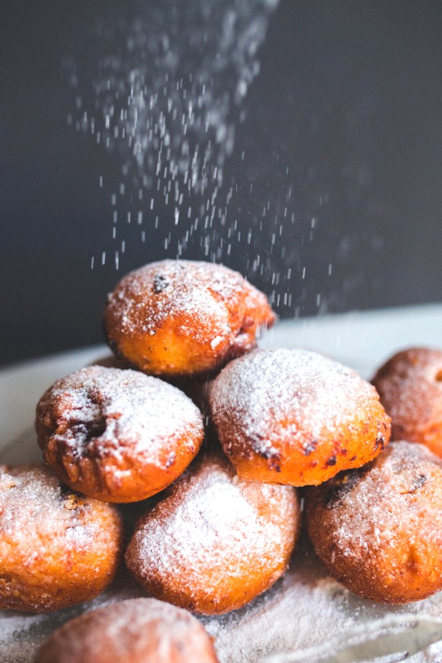 Falling powder sugar on donuts photo