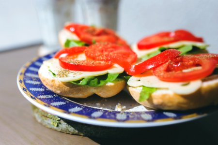 Sandwiches with cheese, lettuce and tomato on a plate