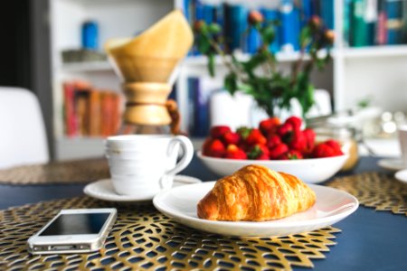 Croissants and strawberry for breakfast photo