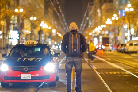 Man Walking in Middle of Road