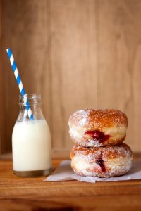 Two Donuts and Glass of Milk photo