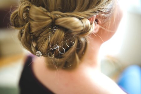 Bride's hair, styled with a hair ornament photo
