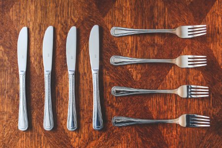 Cutlery: knives and forks photo