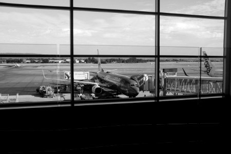 Grayscale Photography of Airliner on Airport photo