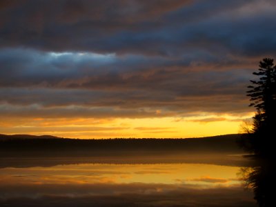 Body of Water Near Mountain photo