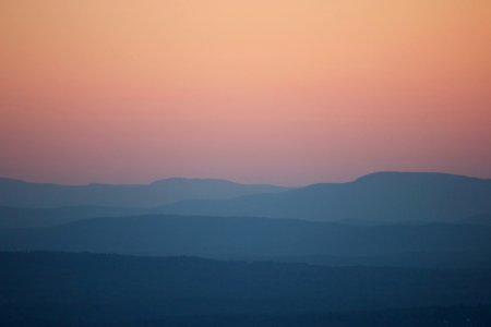 Fogs Covering Hills Under Sky photo