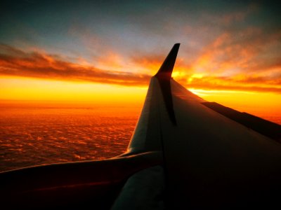 Window Plane Photography of Sunset photo