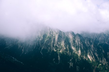 Bird's-eye View of Mountain Covered With Clouds photo