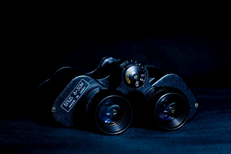 Black Binoculars on Black Pad photo