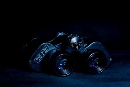Black Binoculars on Black Pad photo