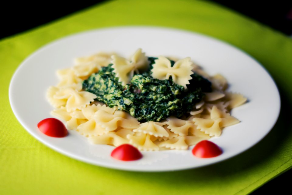 Cooked Pasta With Green Vegetable on Plate in Close-up Photography