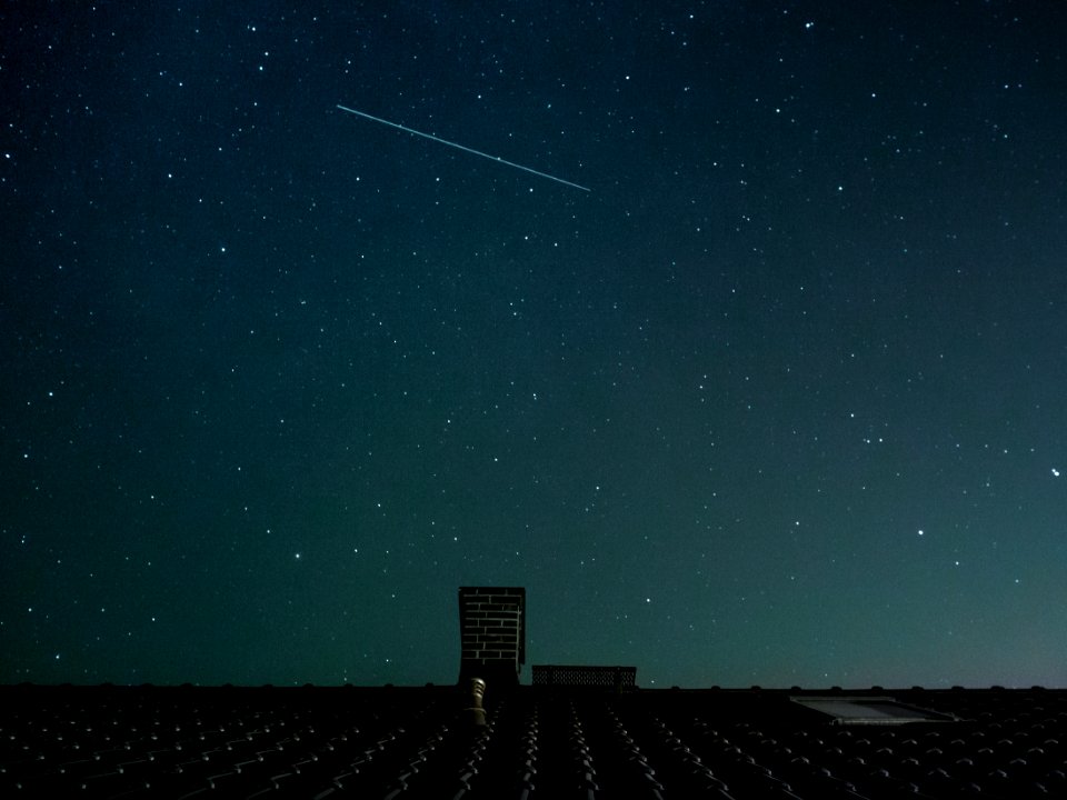 Star Falling over Roof