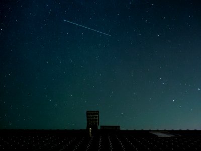 Star Falling over Roof