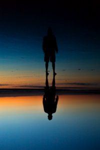 Reflection of Person on Water photo