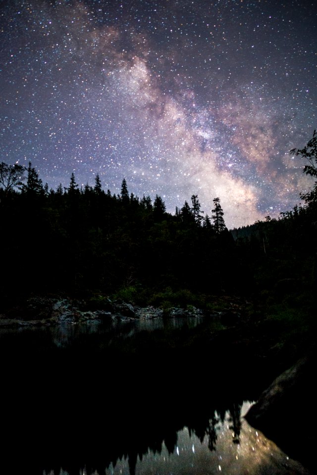 Stars Reflecting on Calm Body of Water