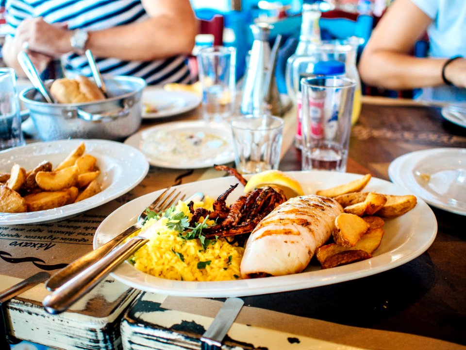 Grilled Seafood on White Plate and Table photo