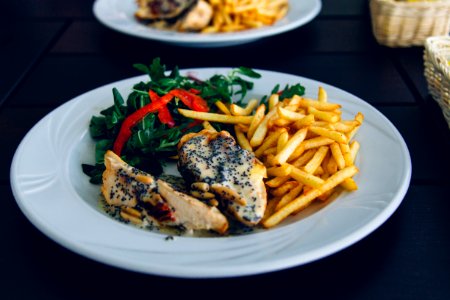 Seafood Dish With French Fries in White Ceramic Plate photo