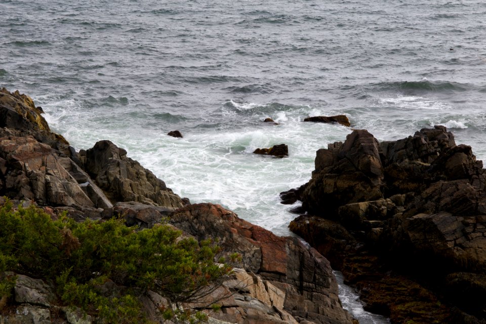 Mountain Rocks Near on Body of Water