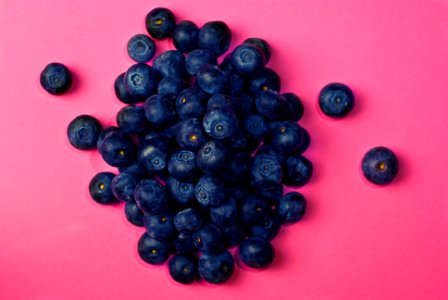 Blueberries on Pink Surface photo