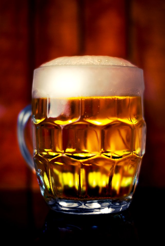 Clear Glass Mug Filled With Yellow Liquid photo