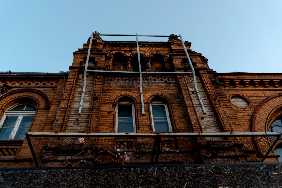 Brown Brick Building Under Blue Sky photo