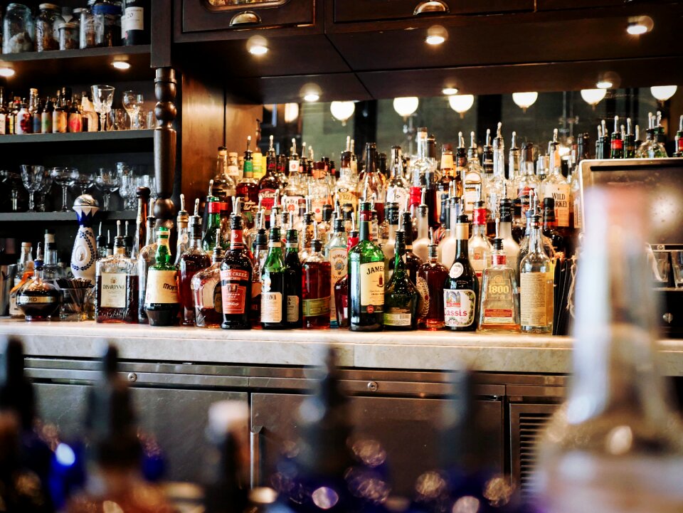 Bottles counter drinking glasses