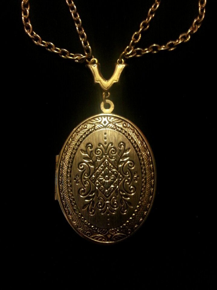 Locket gold black jewelry