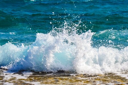 Wave smashing sea photo