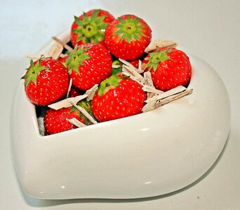 About love for mother's day porcelain heart with strawberries love photo
