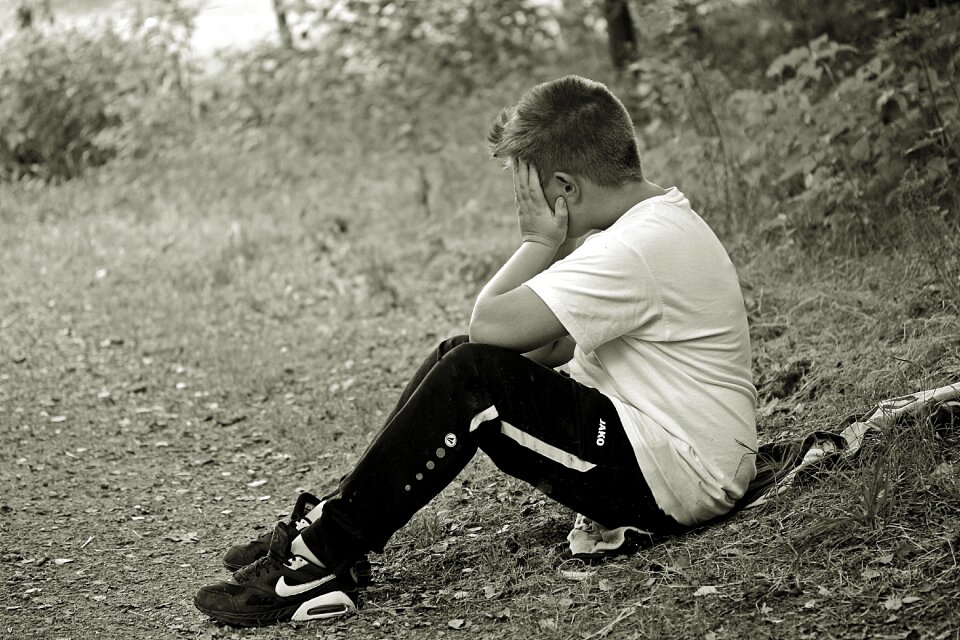 Alone sit sitting on jacket