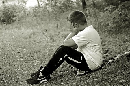 Alone sit sitting on jacket
