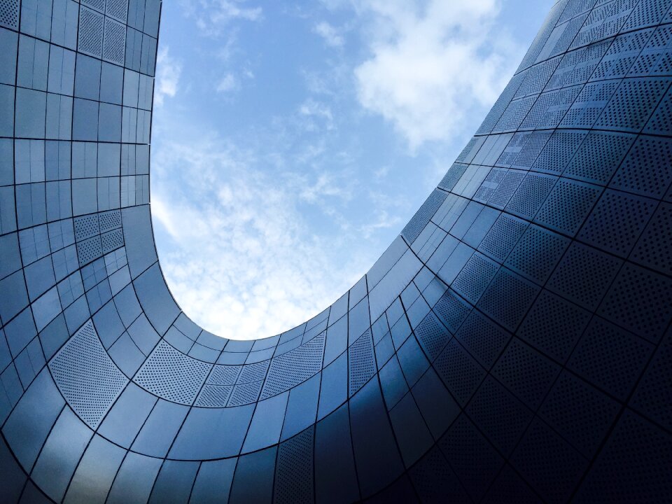 Low angle shot perspective blue building