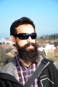 Portrait sunglasses long beard photo