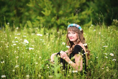 Summer girl in dress girl in a field photo