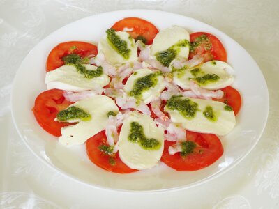 Italian dish pesto tomato photo