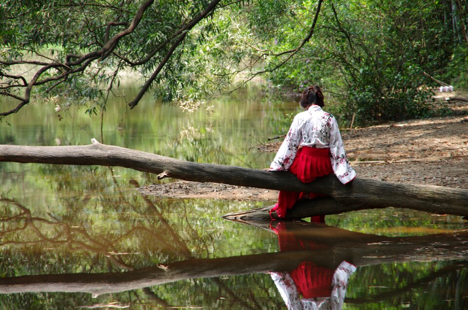 Woman red dress lake