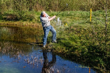 Water hazard golf swing golf course photo