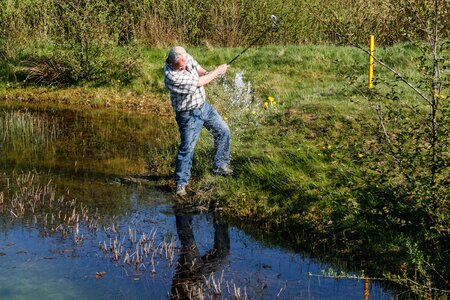 Water hazard golf swing golf course