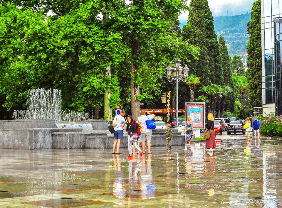 Fountain people reflection