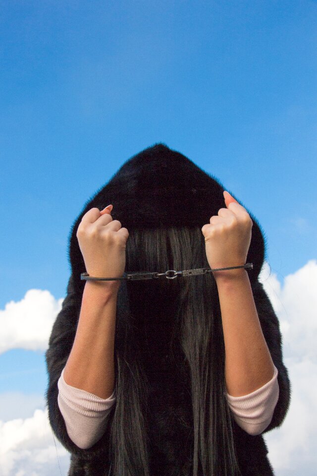 Alcoholic junkie woman in chains
