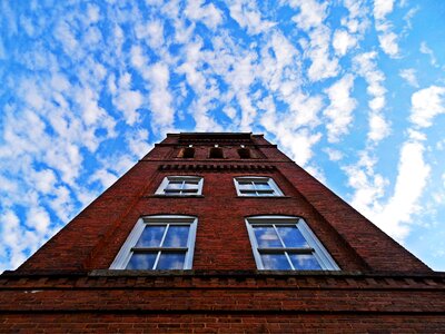 Blue sky brick building photo