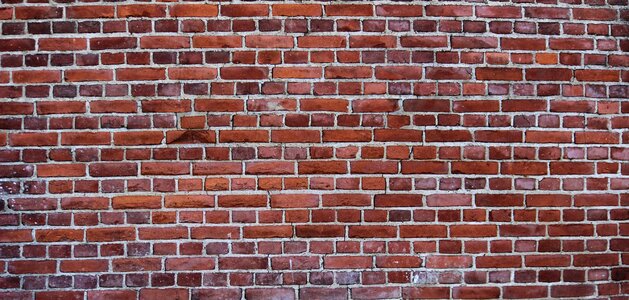 Red background brick texture photo