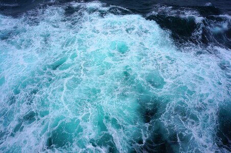 Dark blue water waves photo