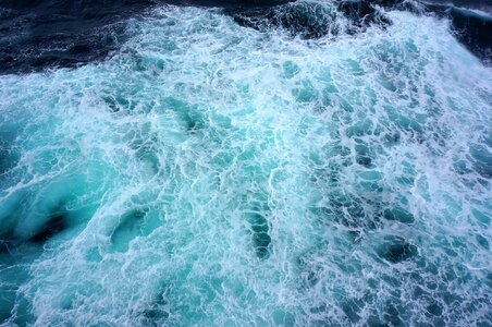 Dark blue water waves photo