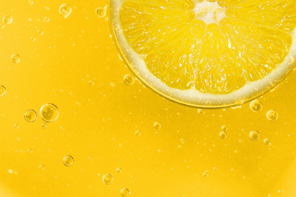 Sour yellow slice of lemon