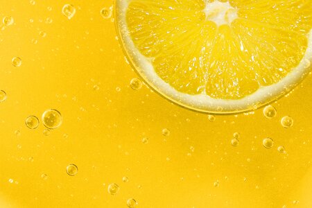 Sour yellow slice of lemon